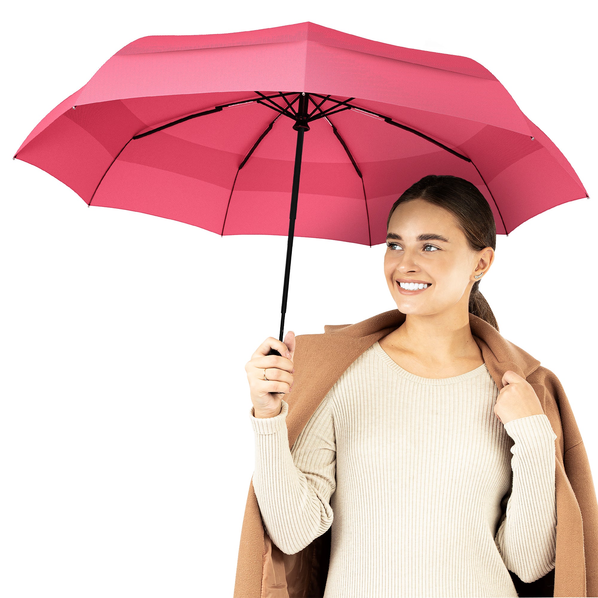 A woman holding the pink travel compact umbrella that is windproof and best selling from Repel Umbrella