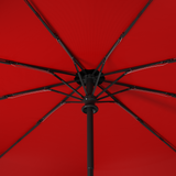 A zoomed in shot of the reinforced fiberglass frame and ribs of the repel windproof automatic and compact best seller umbrella by Repel Umbrella in red and black, where the interior is a bold red