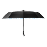 An image of the profile view of a black and blue sky colored, open travel Repel umbrella.