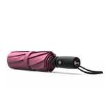 An image of a closed, pink colored travel Repel umbrella. 